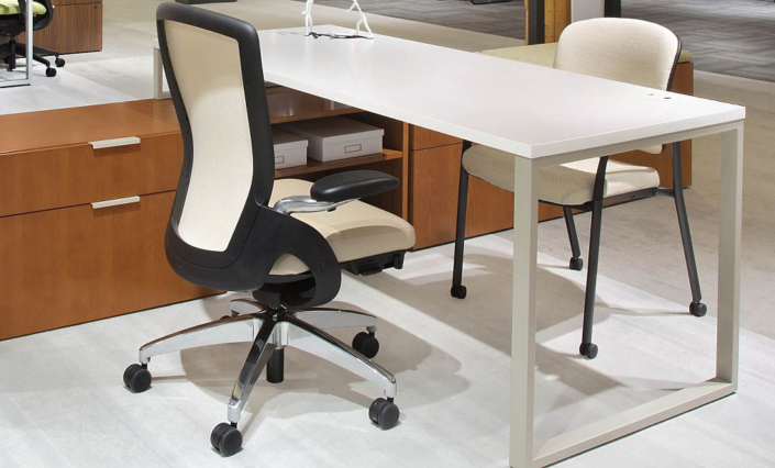 White ergonomic desk with white, black, and chrome task chair