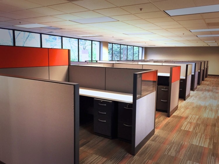 Semi-private modular cubicle work stations with glass panel stackers