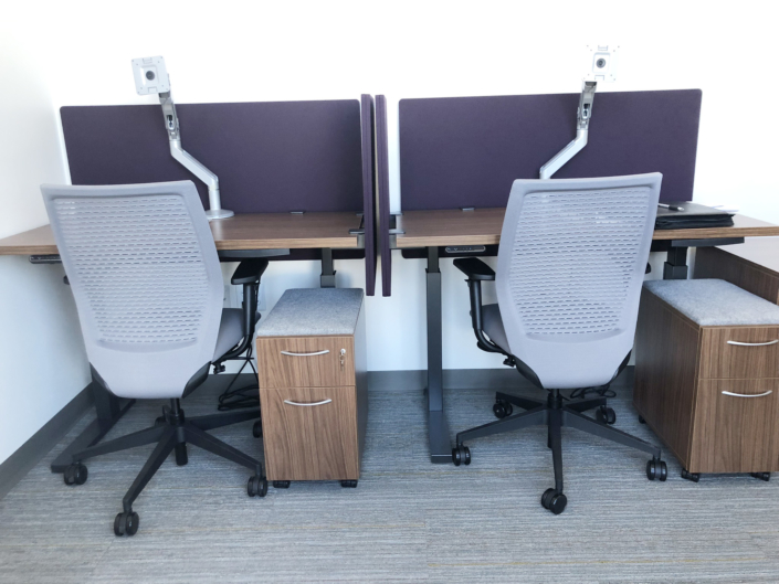 Side-by-side ergonomic work stations with task chairs