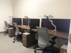 multi-workstation with dividers and mobile pedestals