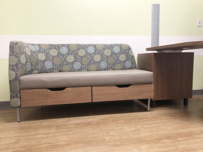 reception area couch with under-mount pull-out storage