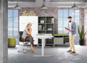 Friant office furniture employees collaborating at height adjustable table