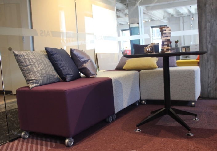 AIS modular upholstered lounge seating and ottoman