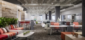 Open concept office interior with modern desks and collaboration areas