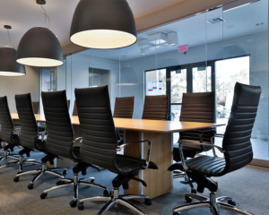 Clear Design traditional conference table with leather task chairs