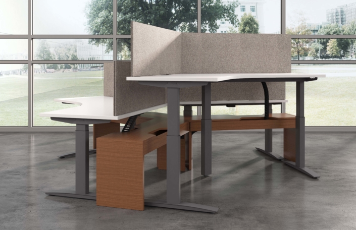 Deskmakers height adjustable work stations with privacy panels