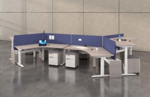 Deskmakers Height adjustable desk workstations with low privacy panels