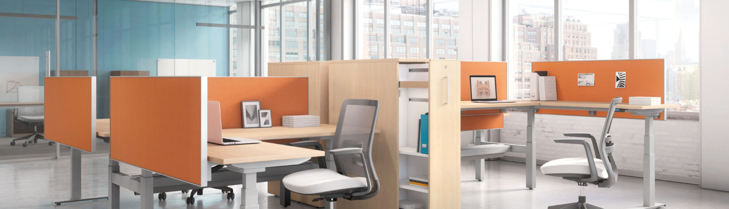 open concept workstations with height adjustable desks and storage