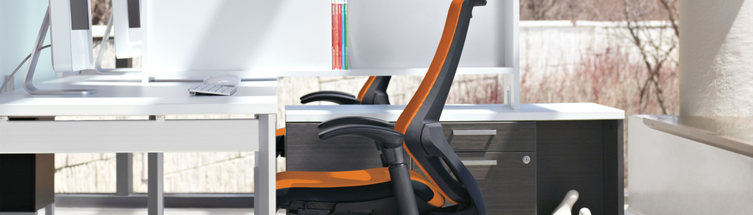 Global furniture workstation with orange and black task chair