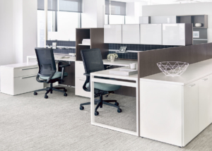 OFS workstations with overhead storage and modern ergonomic desks
