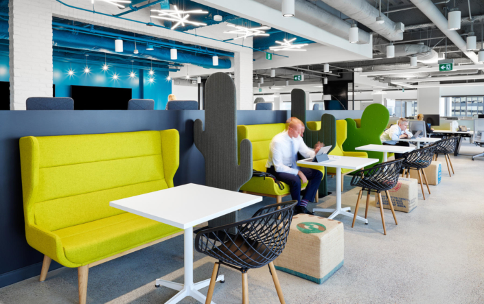 Buzzi Space colorful cafe seating and tables with collaboration spaces