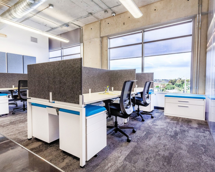 Clear Design commercial work spaces with table top partitions