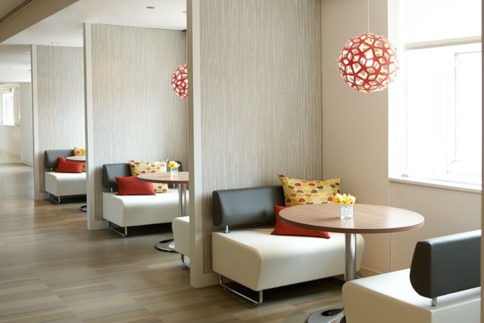 KI Evoke dividing wall with neutral tone lounge furniture