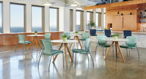 OM Seating break room chairs and tables in bright commercial office space