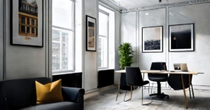 A sleek modern office featuring lounge seating, large windows, and bright decor designed to boost productivity.